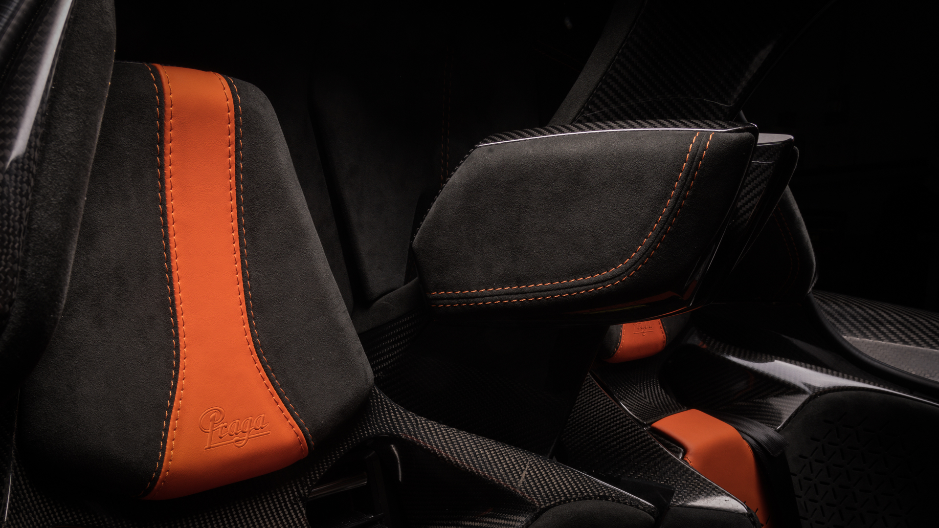 Genuine leather headrests with orange detail