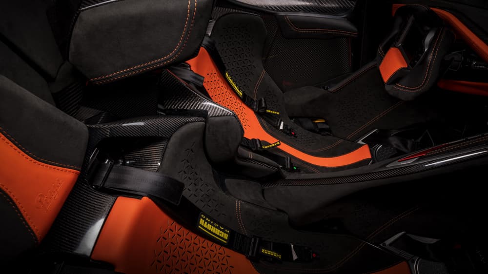 Genuine leather seats with orange detail