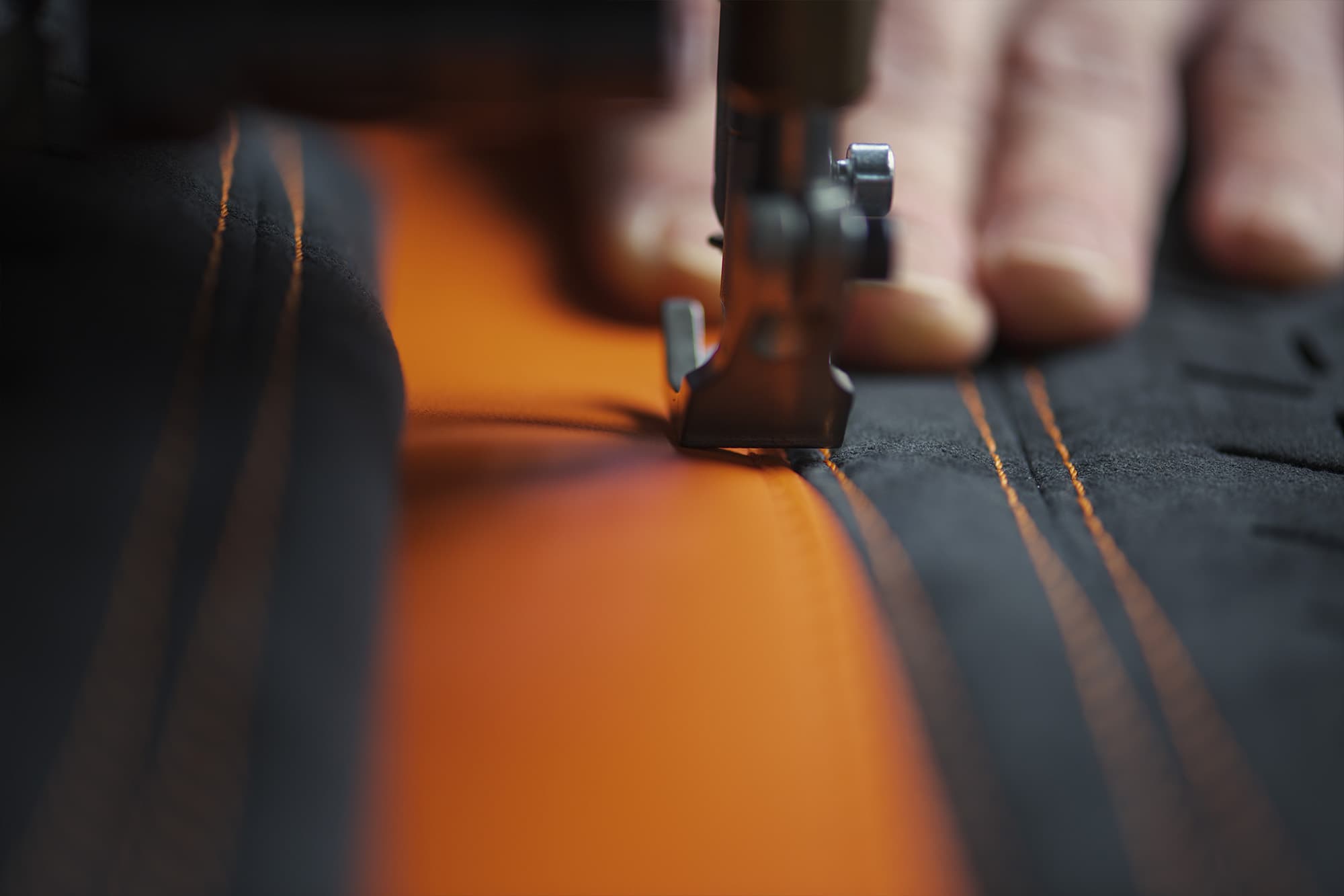 The sewing of the genuine leather